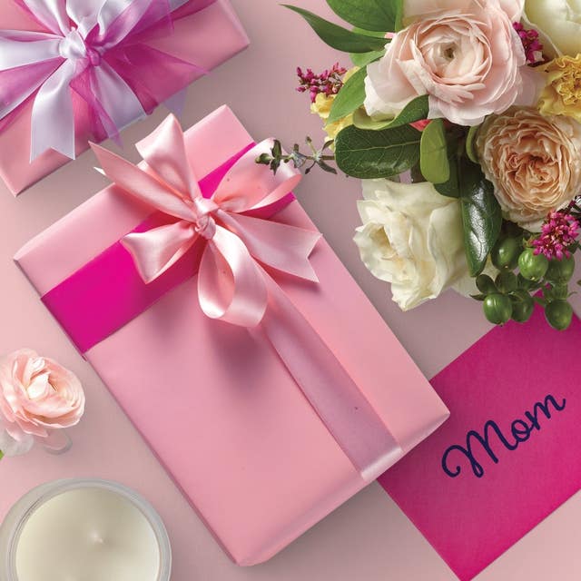 Mother's day gifts wrapped in pink with flowers