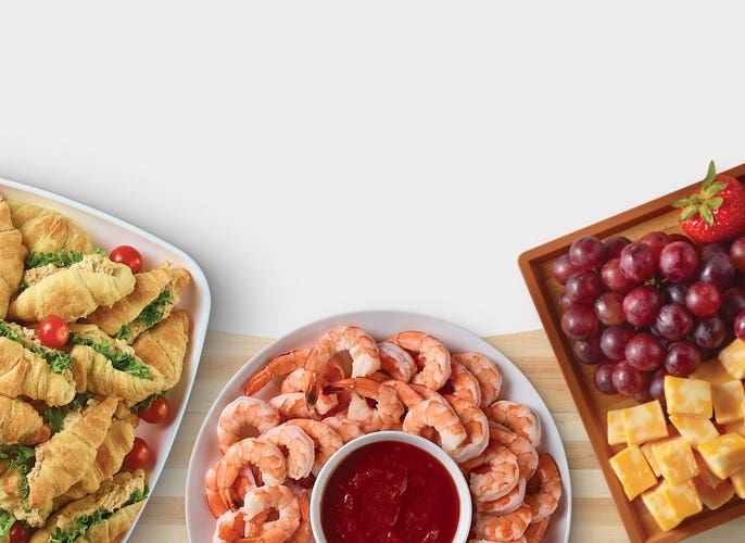 Croissant sandwiches party tray, grapes and cheese board, shrimp party tray