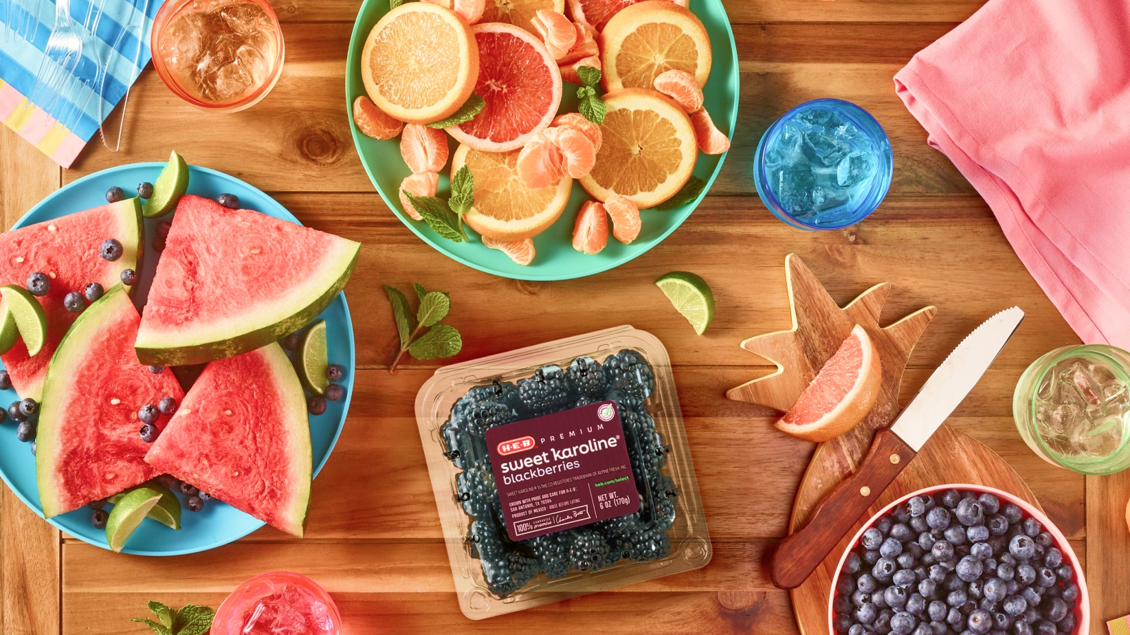 Cut watermelon ,oranges, blueberries & blackberries