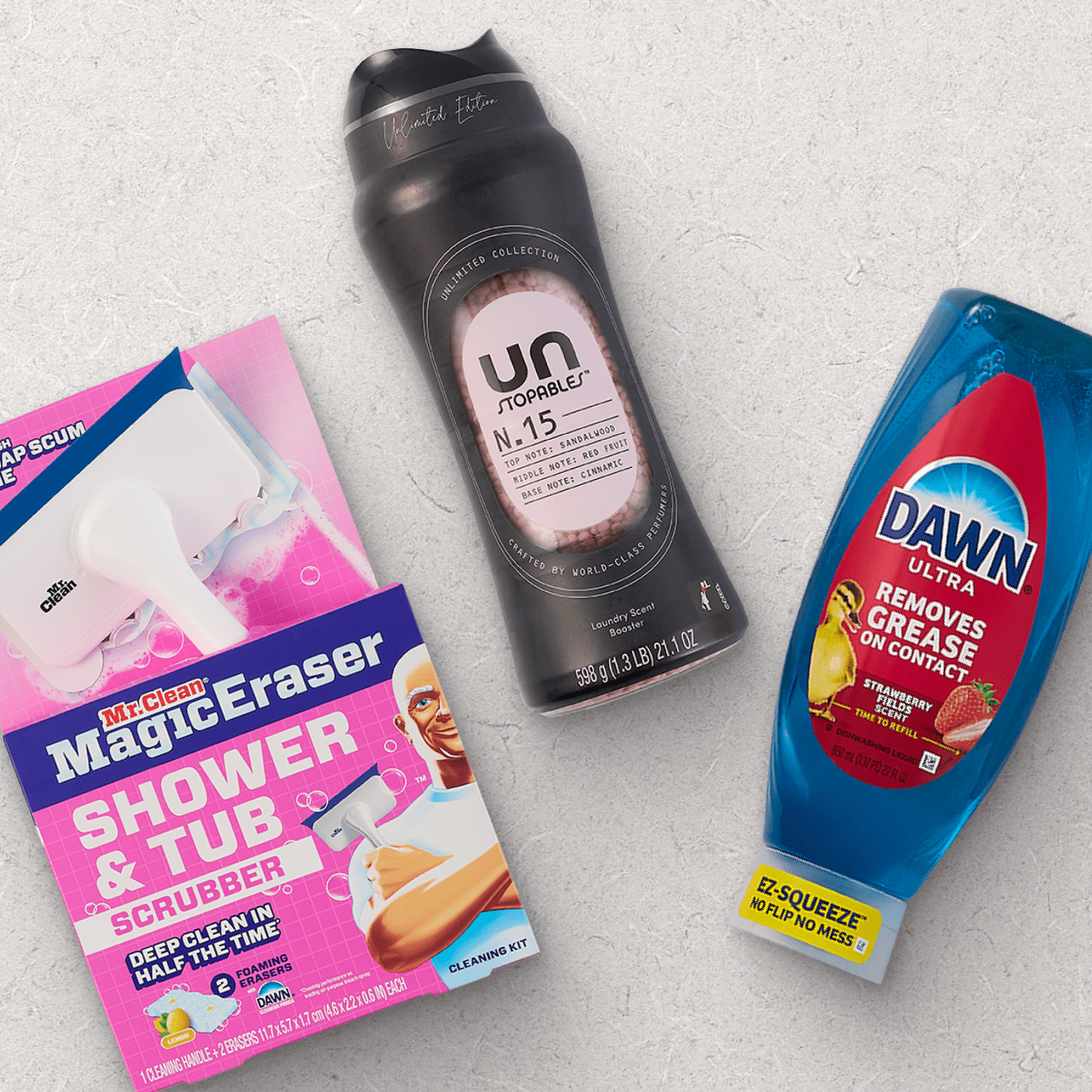 Mr. Clean Magic Eraser Shower & Tub Scrubber, Downy Unstopables N.15 laundry scent booster, and Dawn Ultra dish soap with EZ-Squeeze bottle.