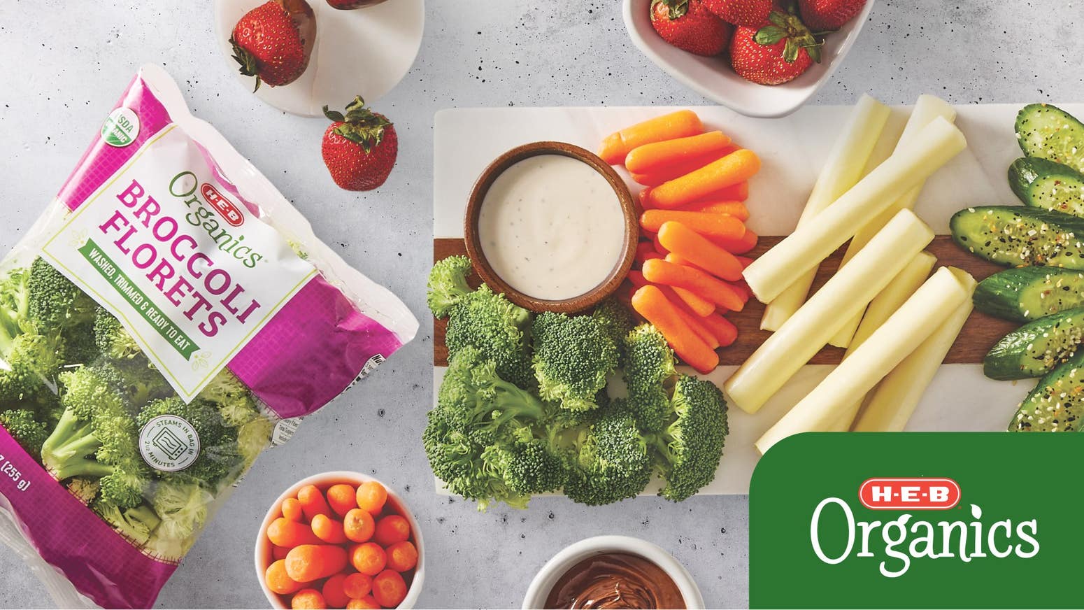 Bowl of spaghetti, salad and strawberries, with H‑E‑B Organics spaghetti pasta